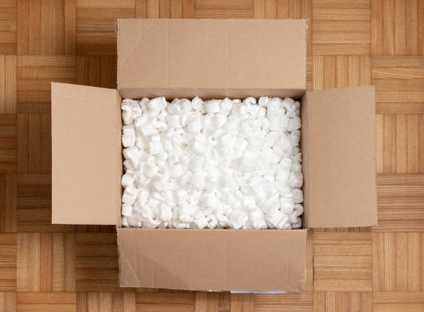 istock A cardboard box with packing styro foam pellets top view 1327158053