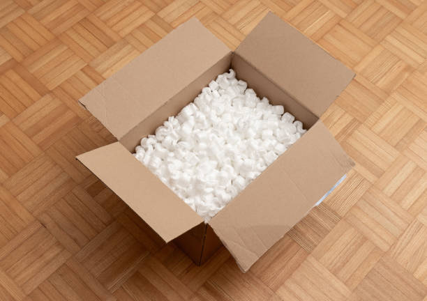 istock A cardboard box with packing styro foam pellets top view 1327158062