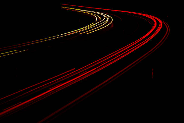 istock lights of cars with night. 1327160598