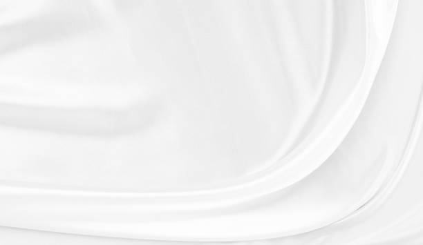 istock White gray satin texture that is white silver fabric silk background with beautiful soft blur pattern natural. 1327171378