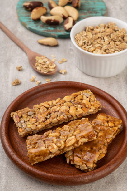 istock Homemade cereal bars with nuts, muesli and honey 1327173208