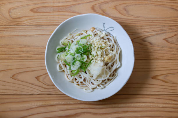 istock chilled uUdon noodles with sauce on the white dish 1327175824
