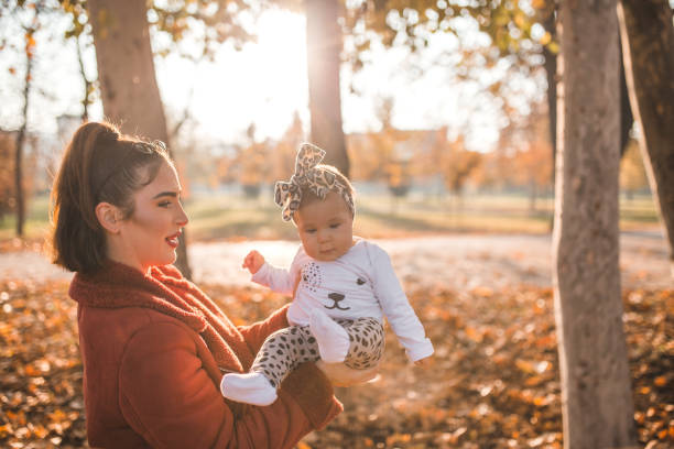 istock Mother spending quality time with her baby in the park 1327189332