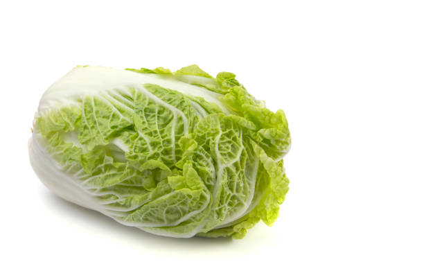 istock Peking cabbage close-up on a white isolated background, free space 1327199260