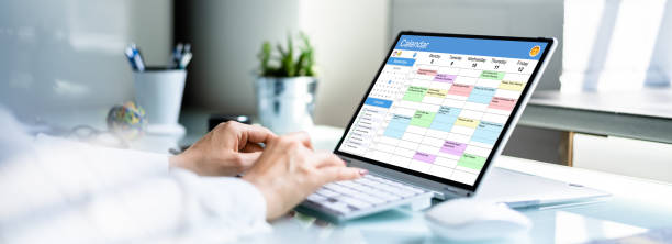 istock Executive Arranging Week Agenda In Calendar 1327202458