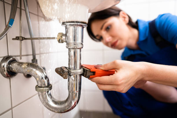 Plumber Fixing Plumber Fixing And Repairing Sink Pipe Water Leak plumber stock pictures, royalty-free photos & images