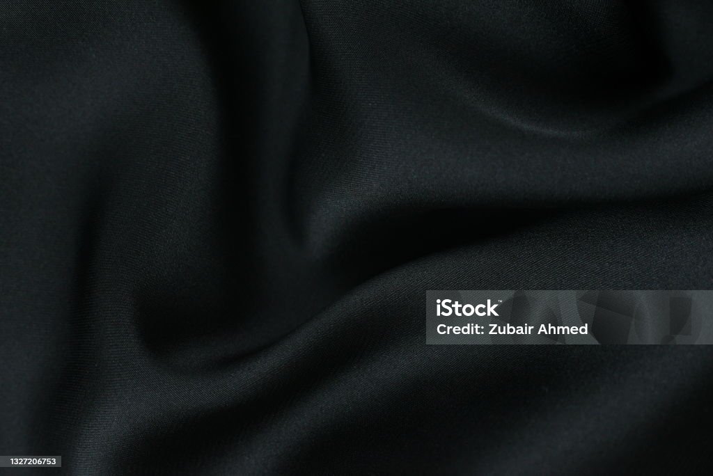 Background fabric. Dark textile fabric with texture and pattern drapery background Abstract Stock Photo