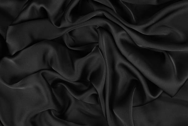 istock Smooth elegant silk or satin luxury cloth texture can use as wedding background. Luxurious background design. 1327206780