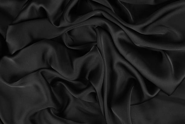 Smooth elegant silk or satin luxury cloth texture can use as wedding background. Luxurious background design. stock photo