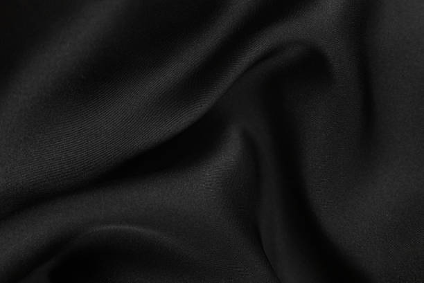 Smooth elegant silk or satin texture can use as abstract background. Luxurious background design stock photo