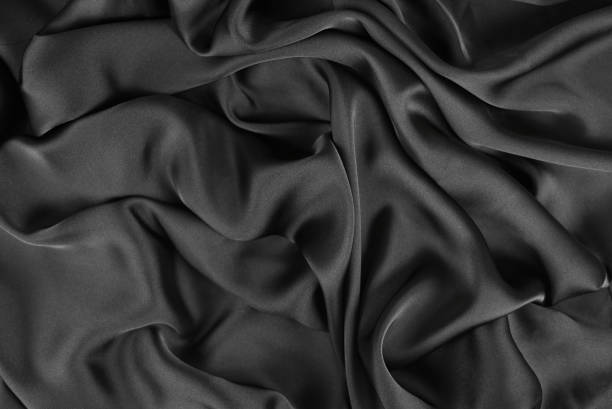 Texture, background, pattern. Texture of silk fabric. Beautiful soft silk fabric. stock photo