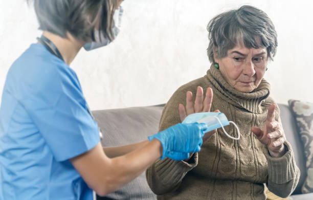 istock Conflict between a young caring nurse and an elderly patient. 1327209906