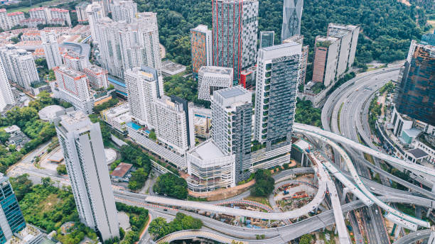 istock Drone view directly above city under construction with incomplete elevated road bridges cross junction 1327215727