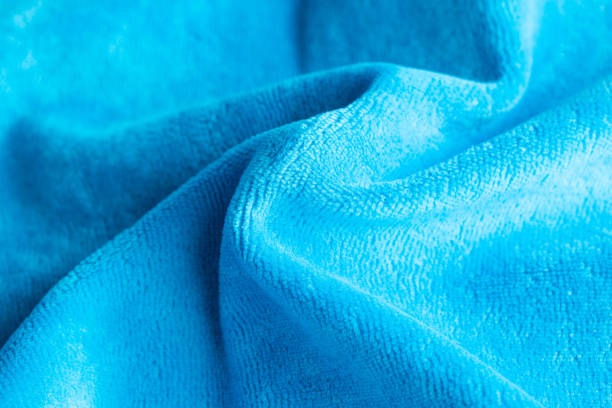 istock Background from blue velvet fabric, macro, classical 1327217922