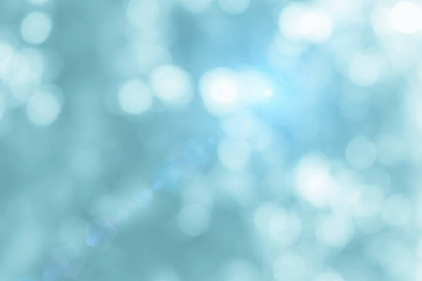 istock Natural spring blurred blue sea background. Create light soft blurred colors bright sunshine. Blue bokeh abstract glitter light background. Focus texture from nature fresh shiny growth seas the day. 1327217972