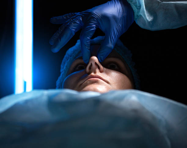 correction of the nasal septum, defects in the shape of the nose in the female patient. Surgical intervention in plastic surgery rhinoplasty and septoplasty. Close-up correction of the nasal septum, defects in the shape of the nose in the female patient. Surgical intervention in plastic surgery rhinoplasty and septoplasty septum stock pictures, royalty-free photos & images