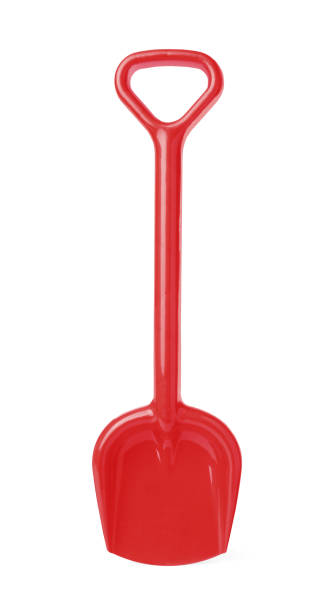 istock Red plastic toy shovel isolated on white 1327221866