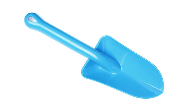 istock Light blue plastic toy shovel isolated on white, top view 1327222319