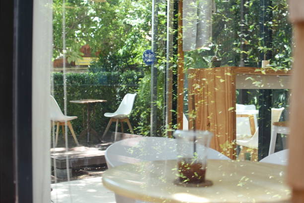 istock Concept and design front of Coffee Shop  and  white seating. 1327222472