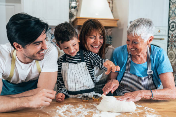 istock family cooking 1327222607