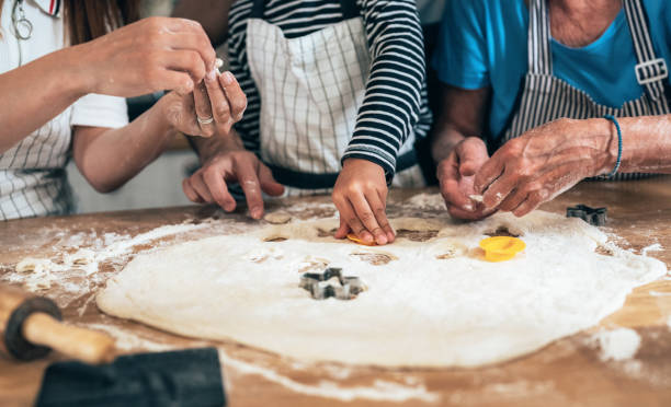 istock Family cooking 1327222611