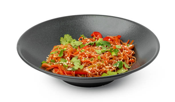istock Bowl with asian wok noodles isolated on white 1327223463