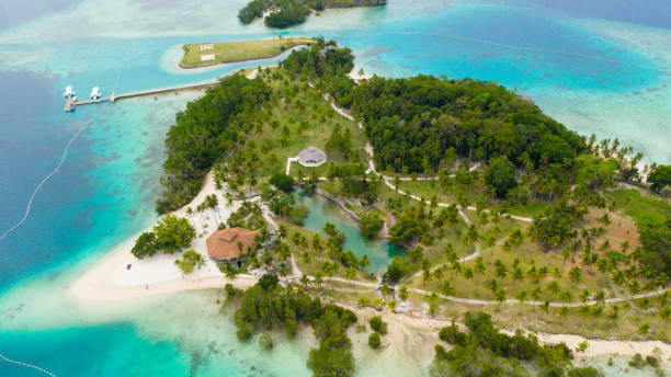 istock Tropical island with beach. Malipano island, Philippines, Samal 1327223490