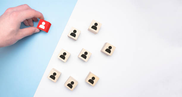 istock Job interview concept - abstract people on wooden cubes. Close up. 1327224529