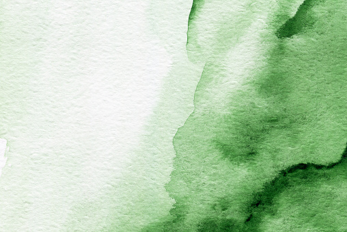 Lienzo de acuarela verde abstracto para texto, logotipo. Fondo de acuarela dibujado a mano photo