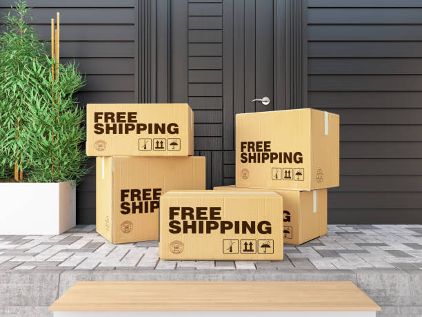 free shipping cargo boxes on doorway - cardboard box package box label imagens e fotografias de stock