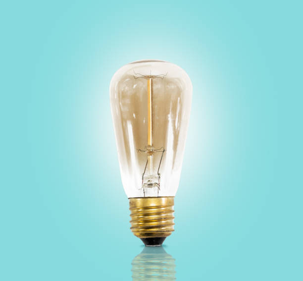 istock Vintage led light bulb on pastel blue background. 1327235678