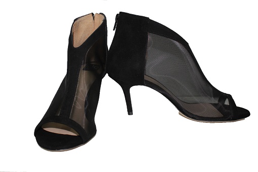 a black pair of woman's shoes