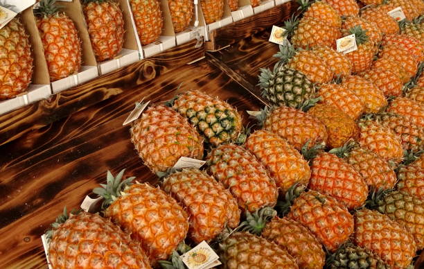 Pineapples, farmers market in display, at Azores, Sao Miguel island. stock photo