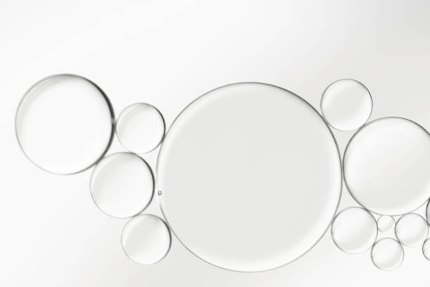 istock Abstract oil droplets on water creative art image. 1327238804