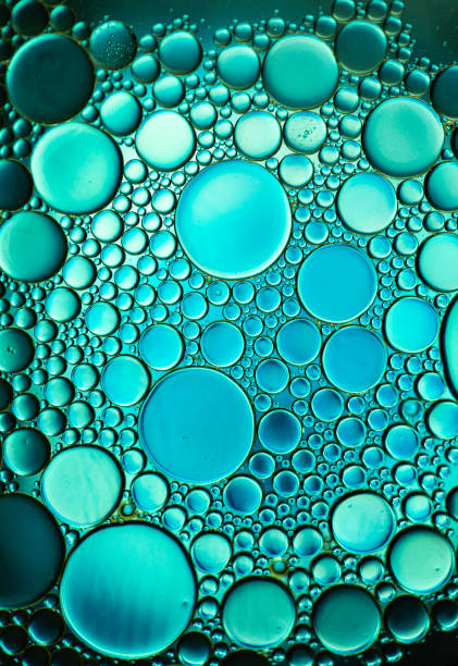 istock Abstract oil droplets on water creative art image and pattern. 1327239093