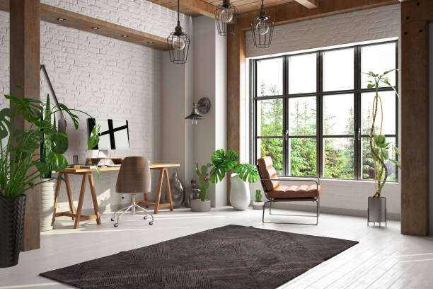 istock Cozy Home Office Interior with a Chair Desk with a Computer 1327239835
