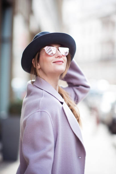 istock young woman walks down the street 1327243312