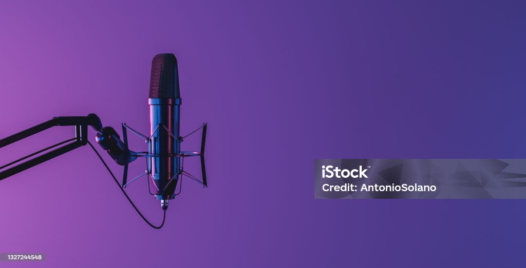 microphone with neon light studio microphone isolated on dark background with neon lighting and space for text. 3d render Podcasting Stock Photo