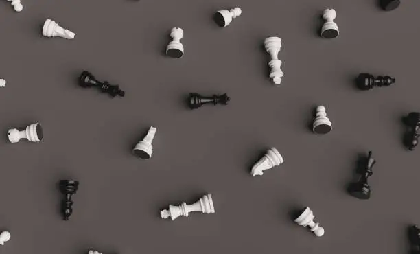 black and white chess pieces disordered on dark background. abstract pattern. 3d render