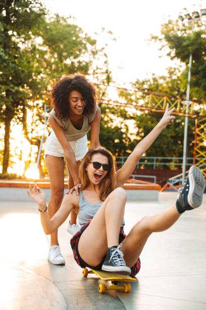 istock Two excited young girls having fun 1327246800