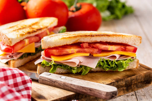 istock Sandwich with tomato,lettuce,ham and cheese 1327248056
