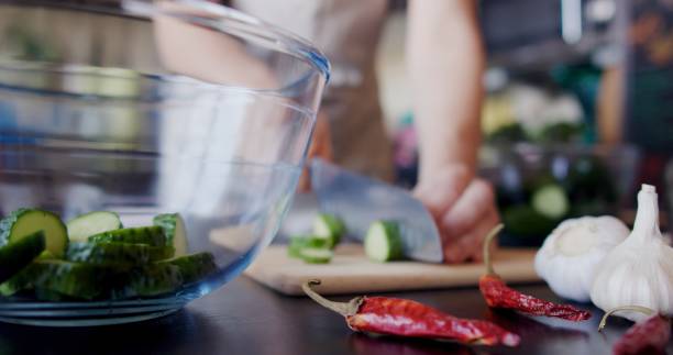 istock Preparing quick pickles of fresh cucumbers 1327248629