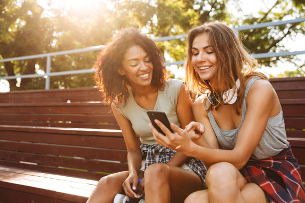 istock Two excited young girls having fun together 1327249658