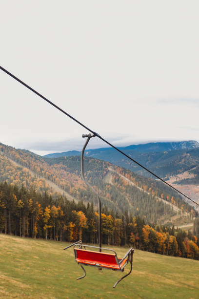Empty ski lift in the autumn mountains