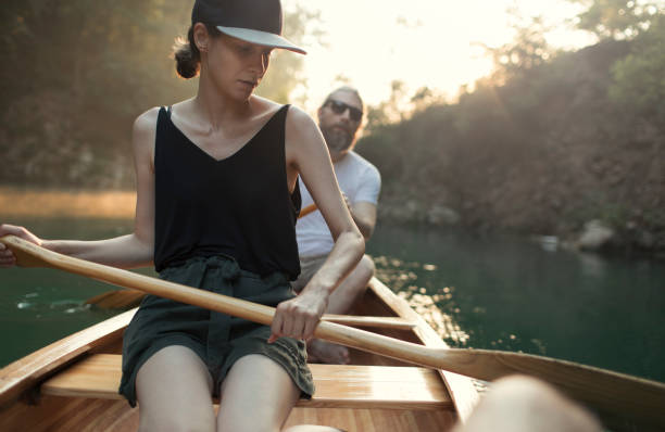 istock Couple enjoying a canoe ride 1327254113