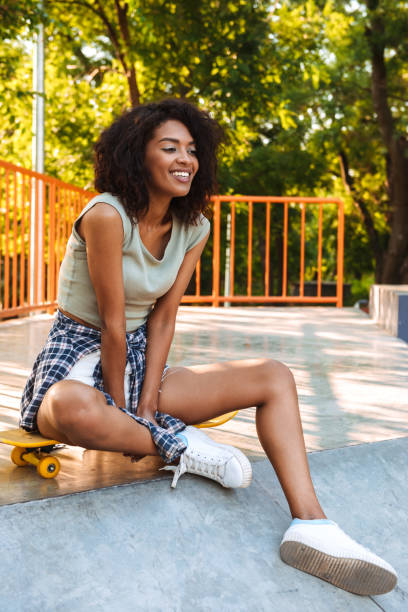 istock Joyful young afro american girl 1327258465
