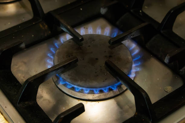 istock a flame burning on a gas stove in the kitchen 1327259042
