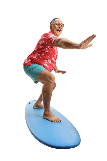 istock Mature man riding a surfing board 1327262674