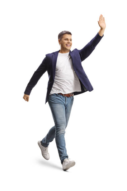istock Full length shot of a man running and gesturing wait with hand 1327263040