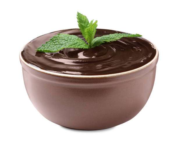 istock Delicious chocolate cream with mint in bowl on white background 1327265989